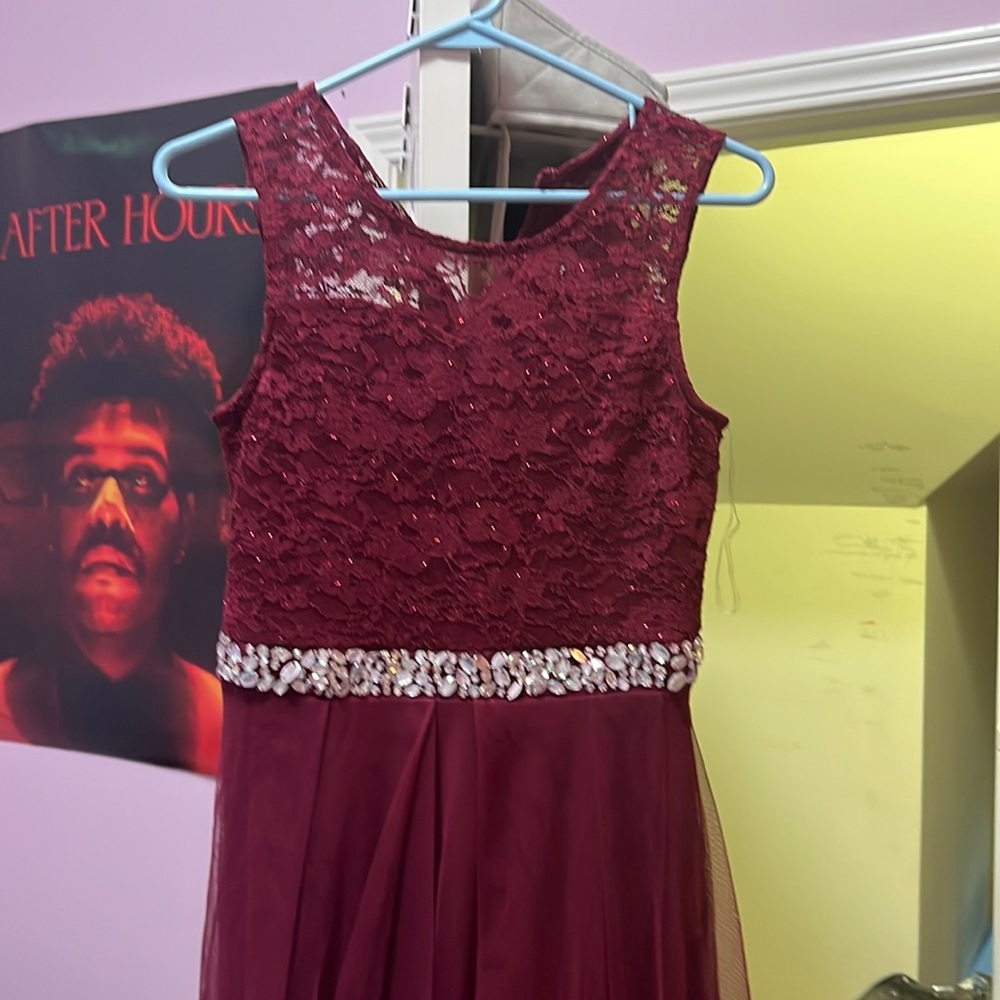 Beautiful floor length dress with lace too and wavy bottom